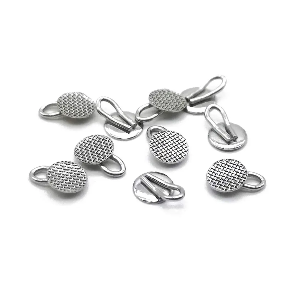 Orthodontic traction hook used for impacted tooth eruption and elastic force application by Biosurgico Orthodontic traction hook used for impacted tooth eruption and elastic force application by Biosurgico