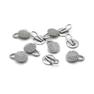 Orthodontic traction hook used for impacted tooth eruption and elastic force application by Biosurgico